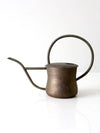 vintage brass watering can