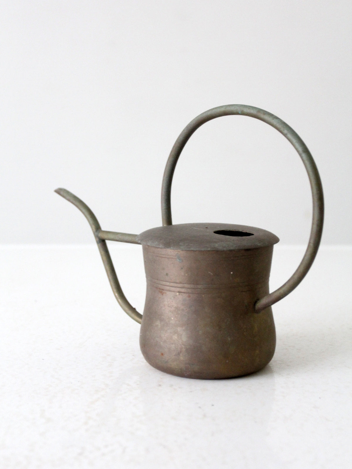 vintage brass watering can
