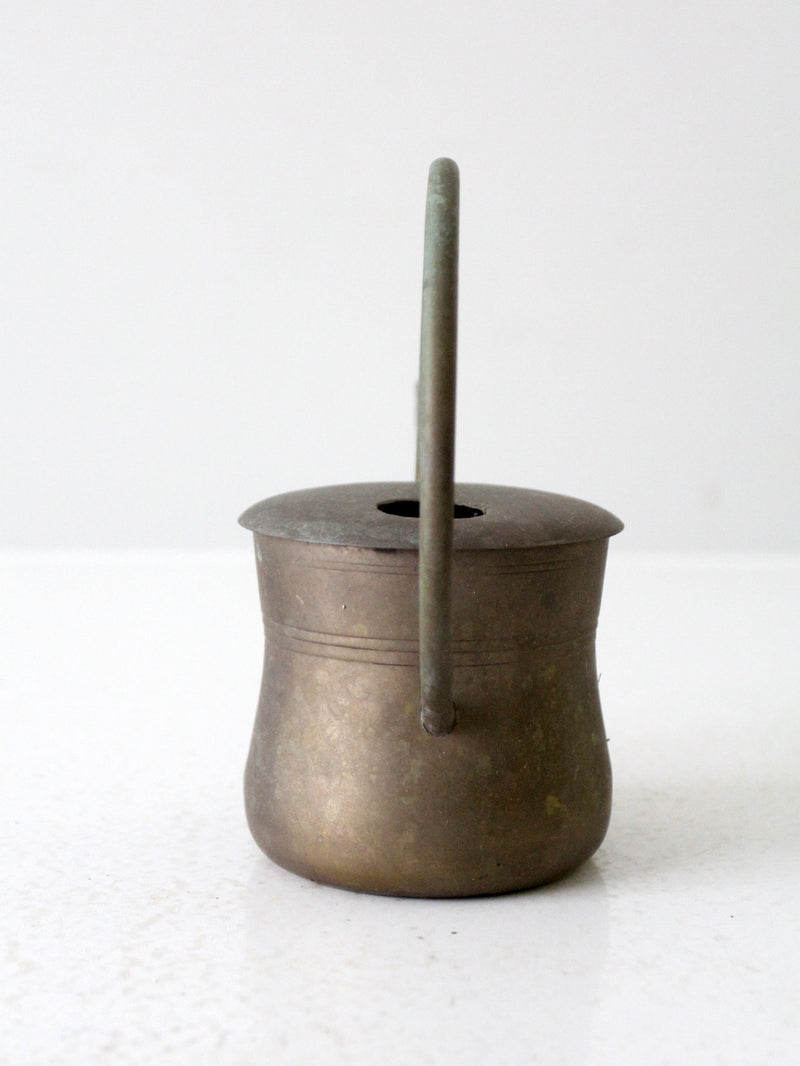 vintage brass watering can