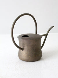 vintage brass watering can