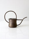 vintage brass watering can