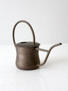 vintage brass watering can