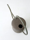 vintage brass watering can