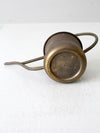 vintage brass watering can