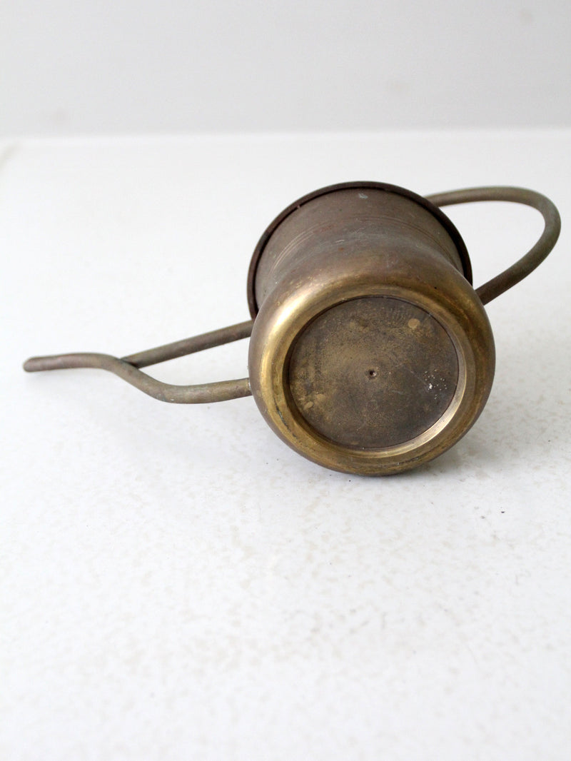 vintage brass watering can