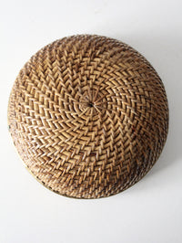 mid-century woven rattan bowl with brass rim