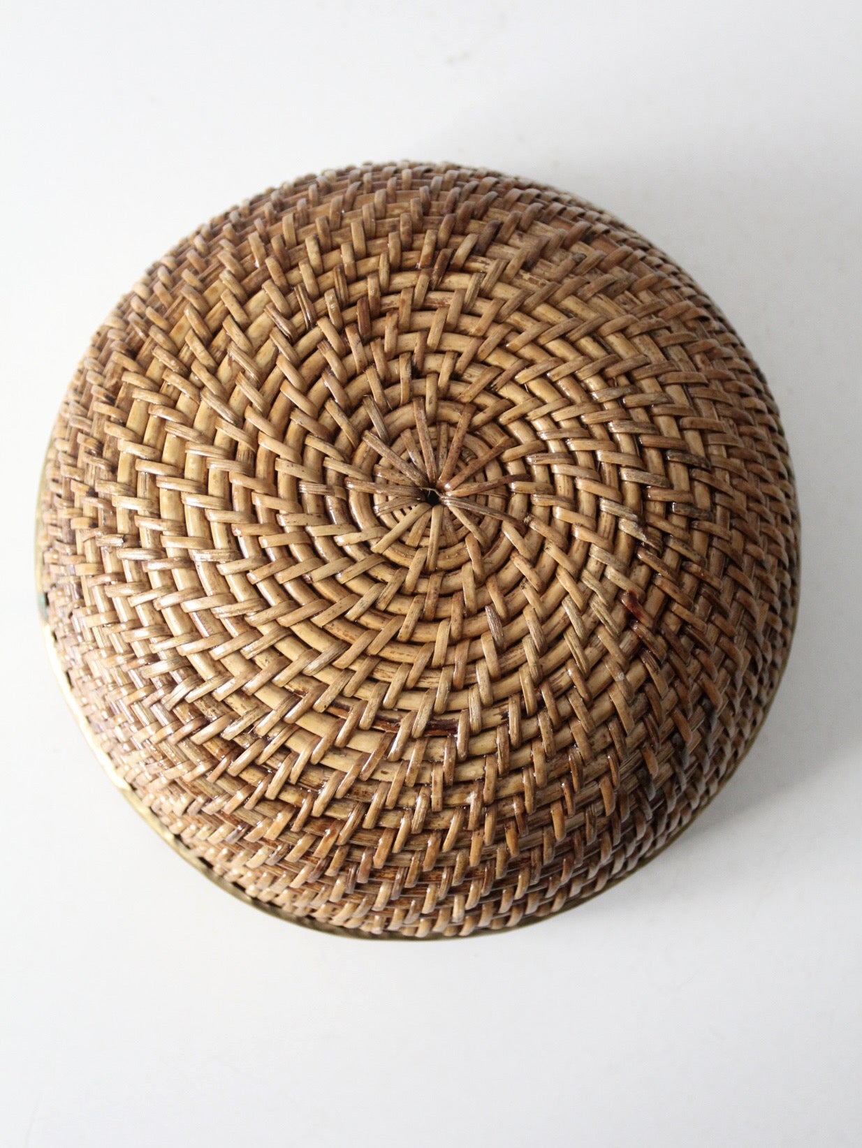 mid-century woven rattan bowl with brass rim