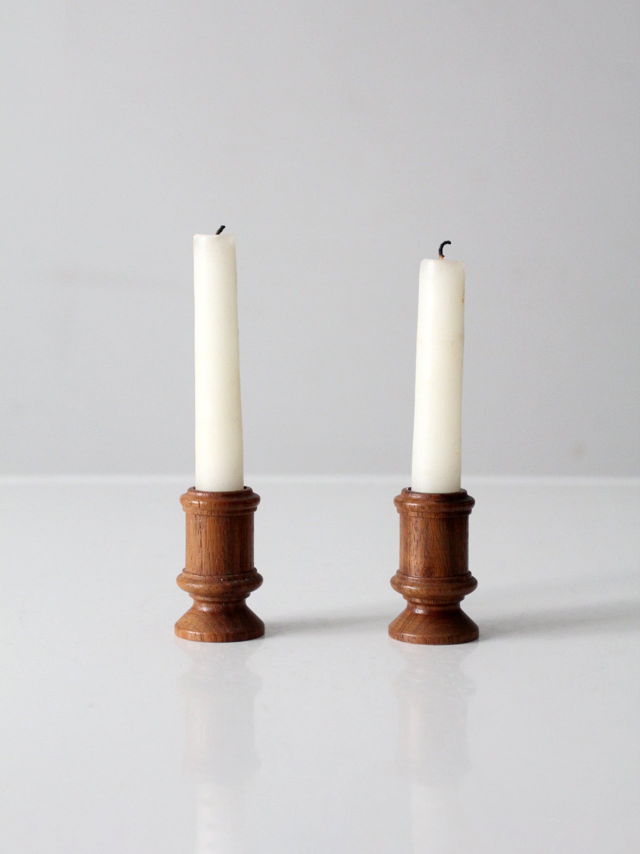 vintage turned candlestick holders pair