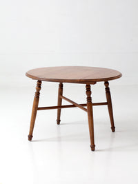 vintage round wood coffee table with turned legs