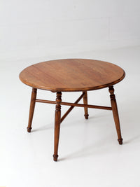 vintage round wood coffee table with turned legs