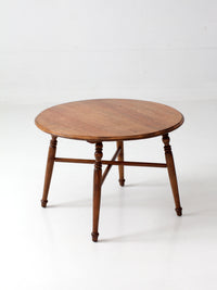 vintage round wood coffee table with turned legs