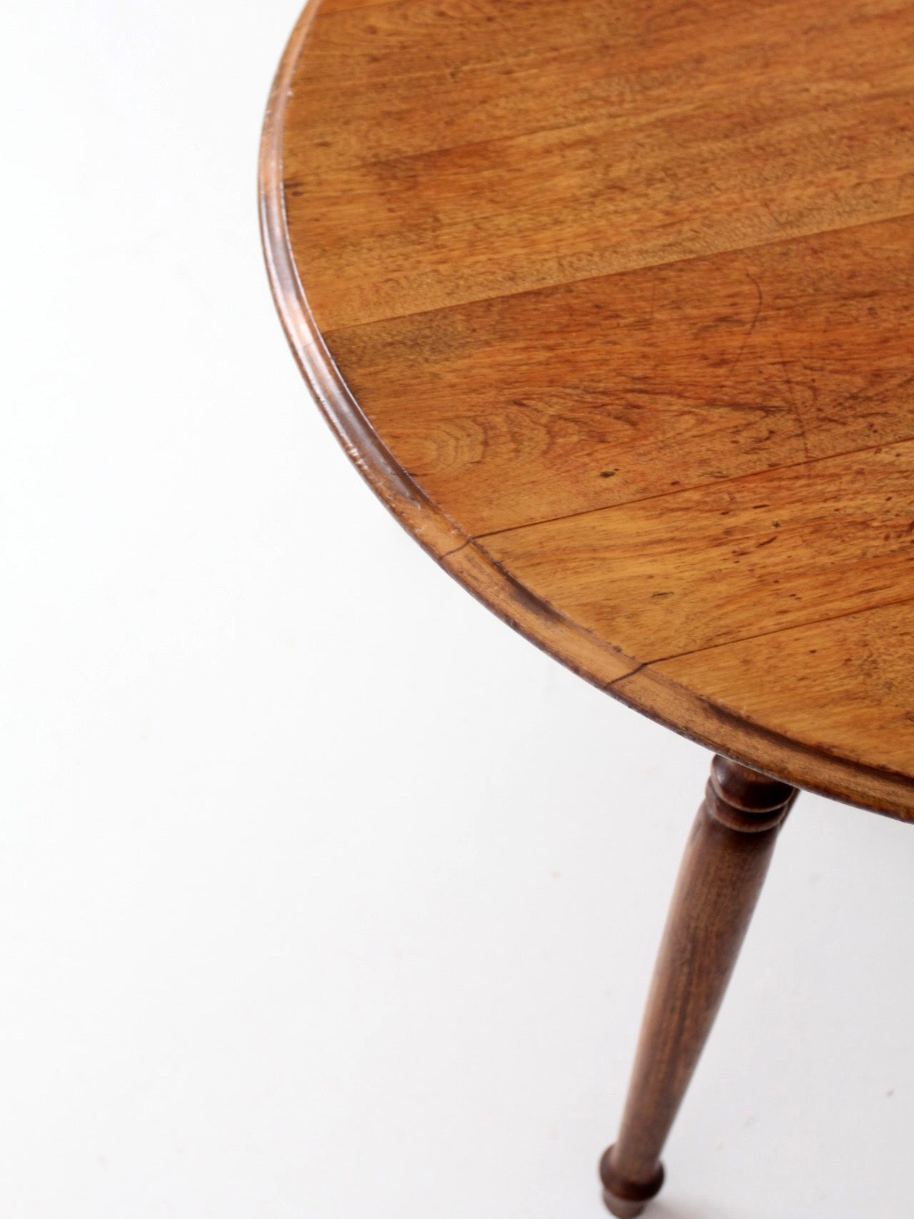 vintage round wood coffee table with turned legs
