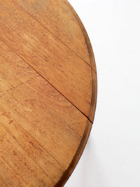 vintage round wood coffee table with turned legs