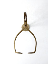 antique brass wall mount ice block tongs