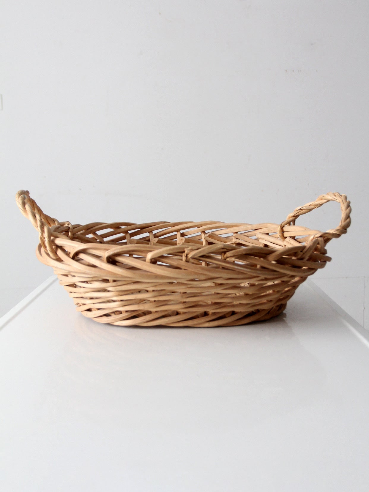 large vintage handwoven gathering basket