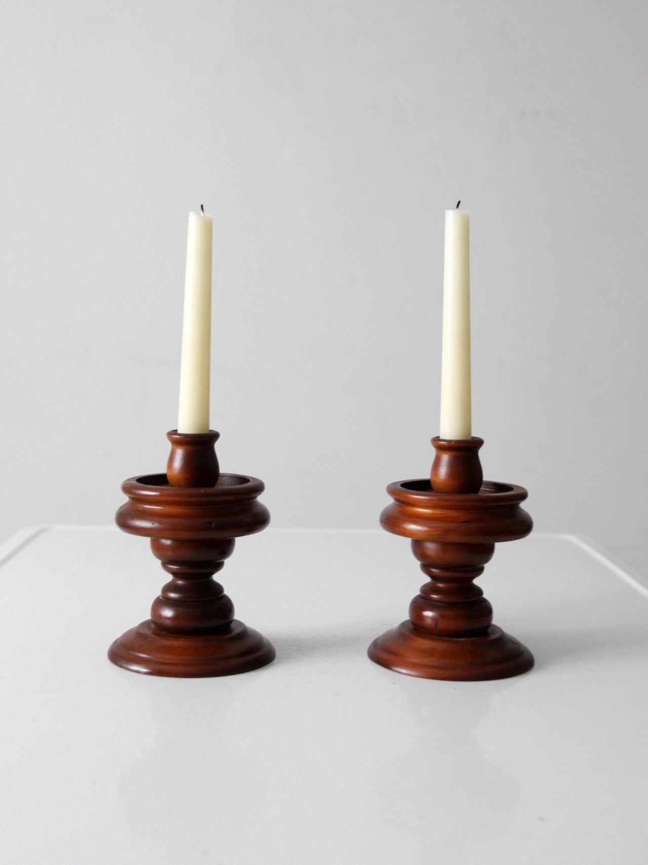 vintage turned wooden candlestick holders pair