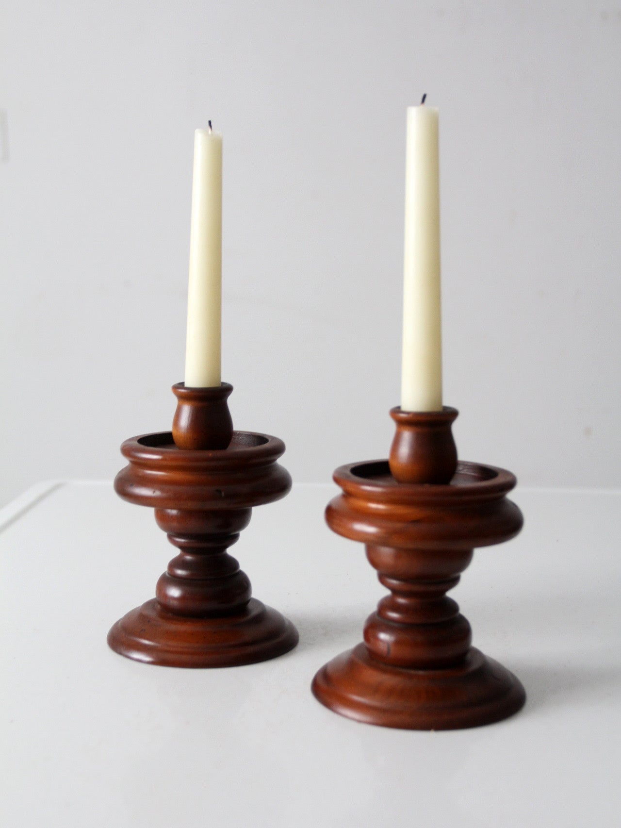 vintage turned wooden candlestick holders pair