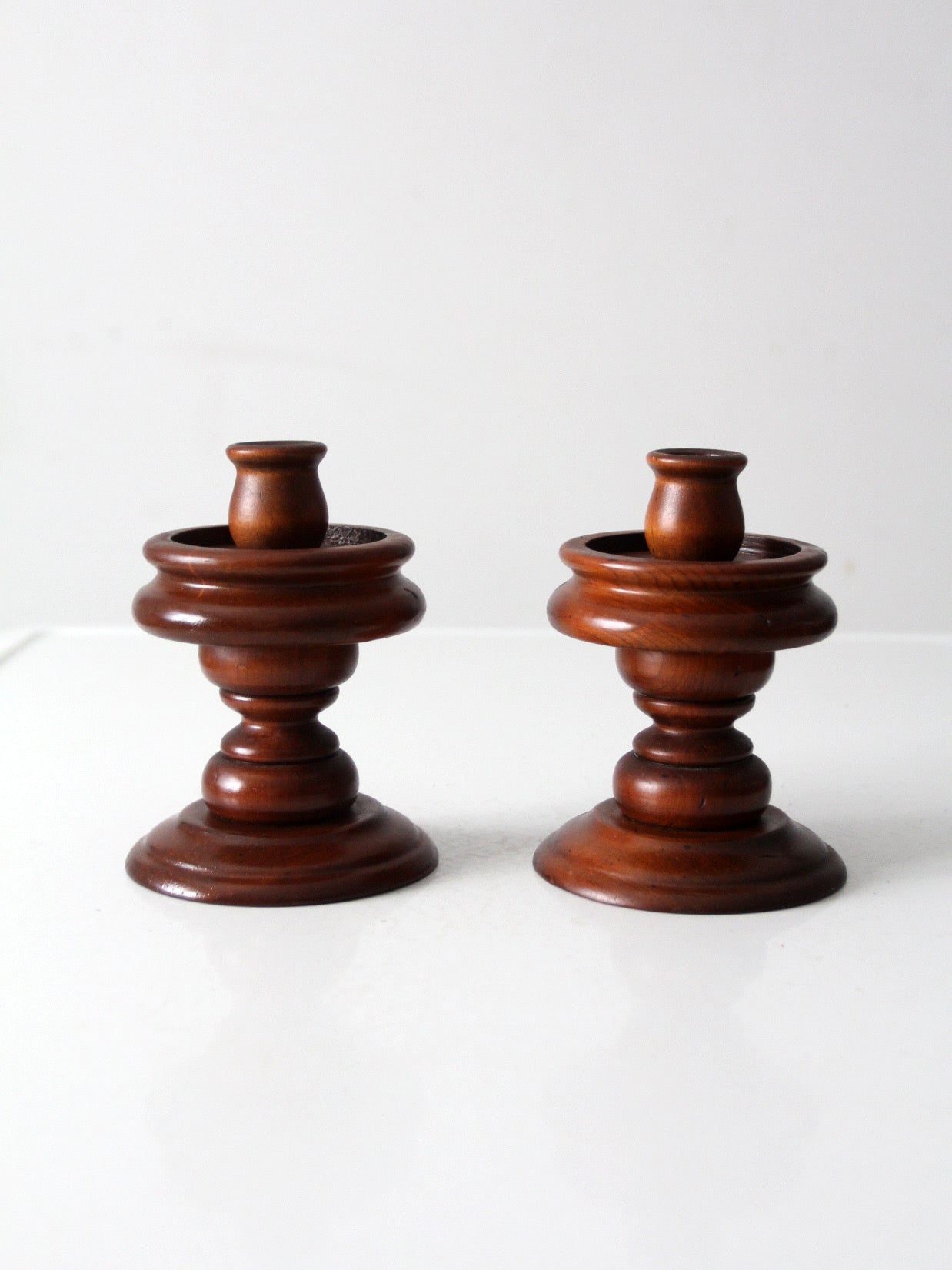 vintage turned wooden candlestick holders pair
