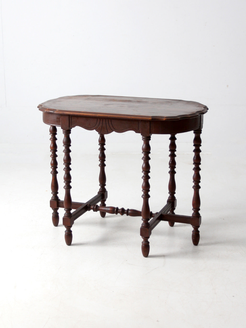 antique accent table with scalloped top