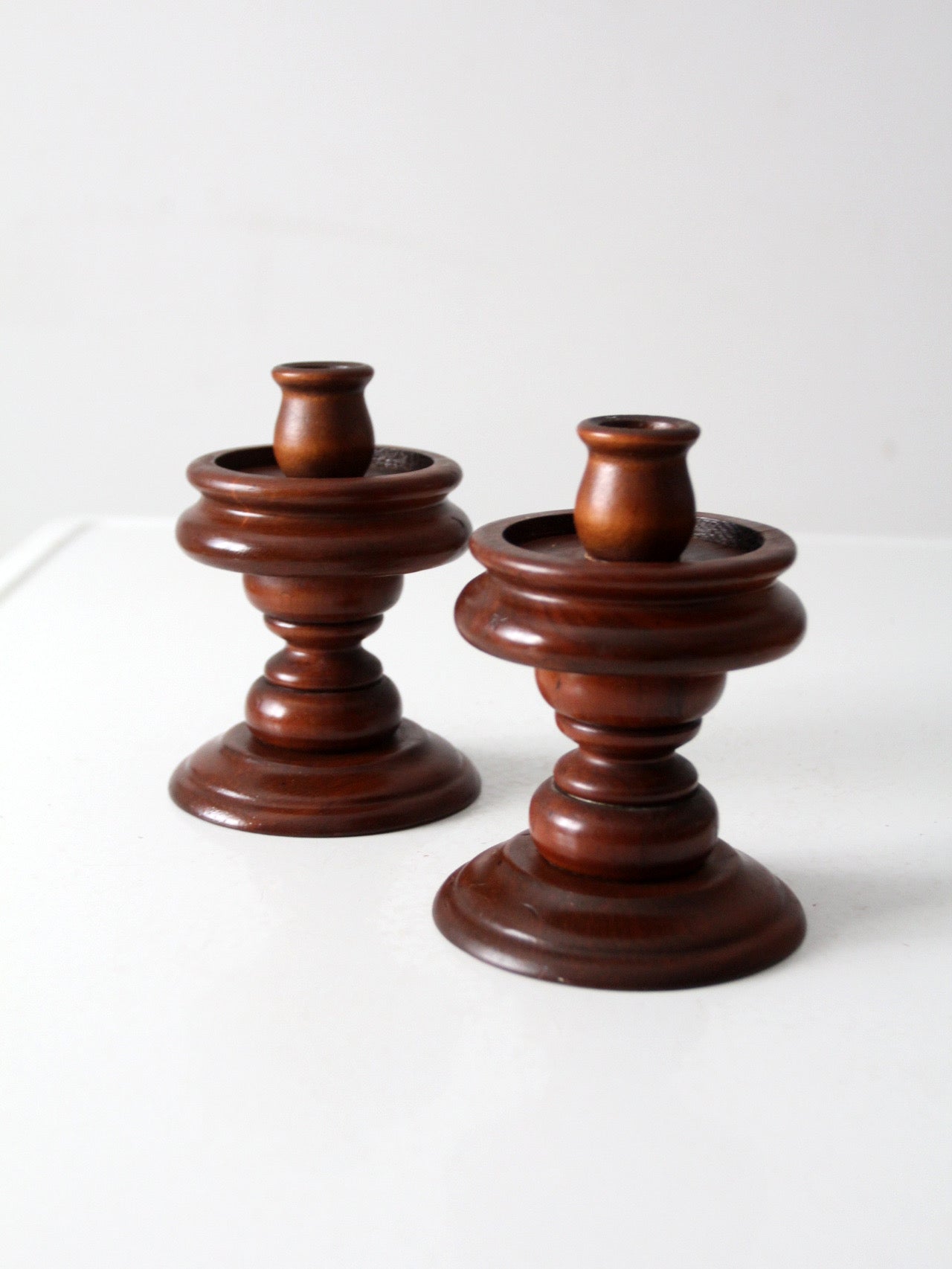 vintage turned wooden candlestick holders pair