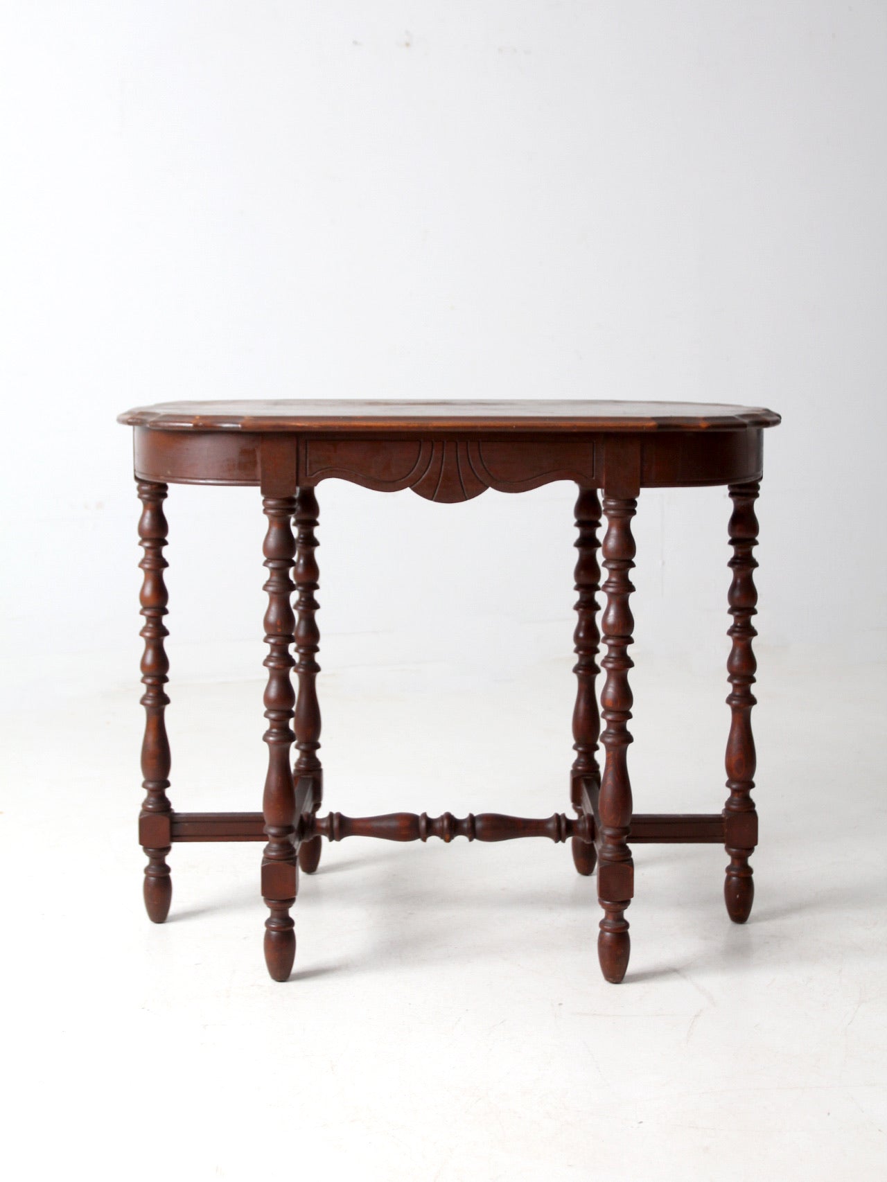 antique accent table with scalloped top