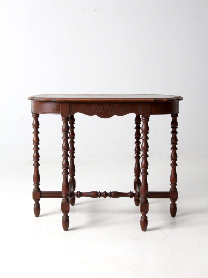 antique accent table with scalloped top