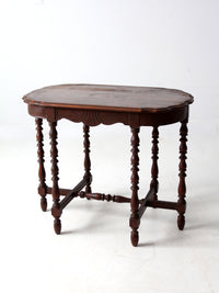 antique accent table with scalloped top