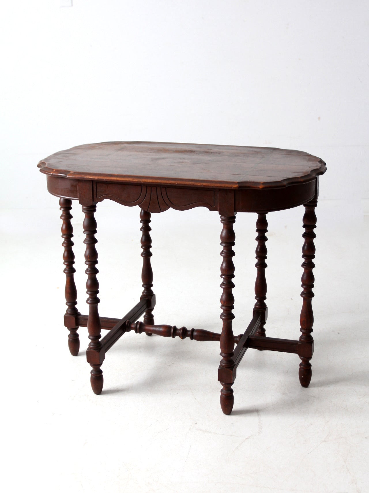 antique accent table with scalloped top