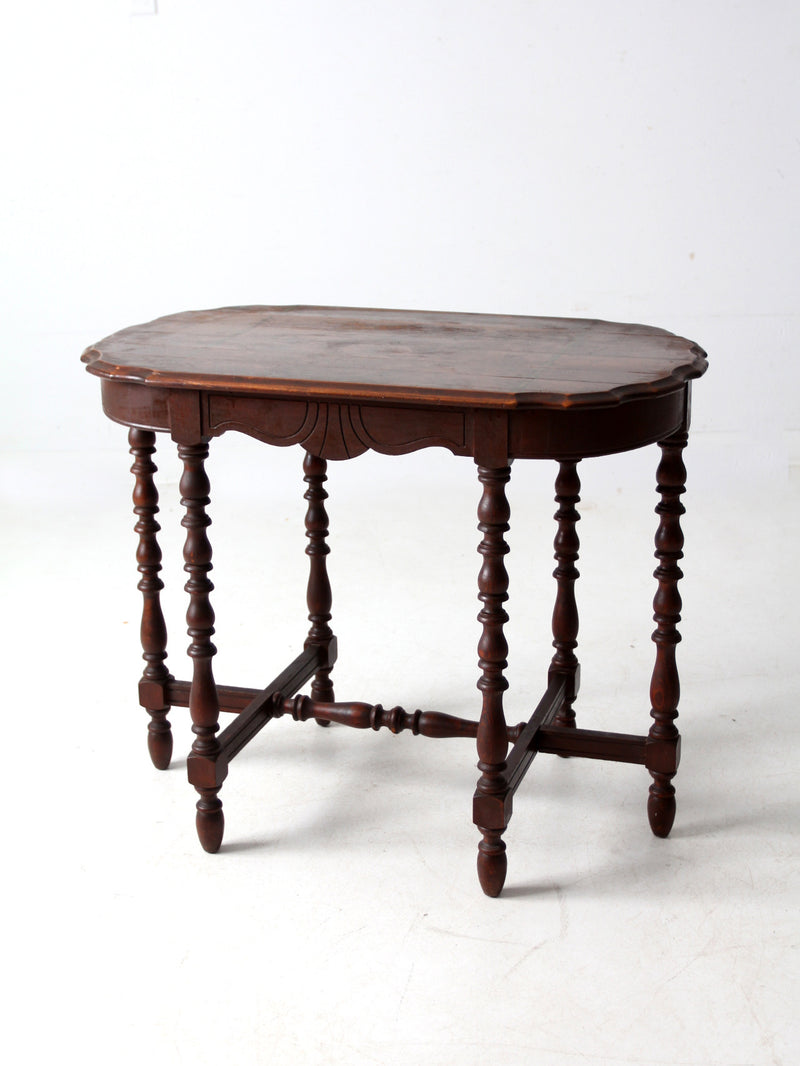 antique accent table with scalloped top