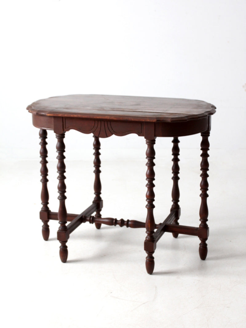 antique accent table with scalloped top