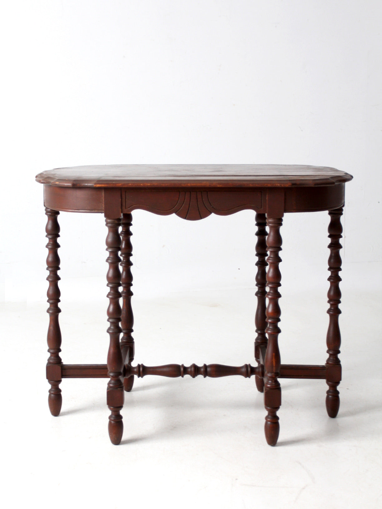 antique accent table with scalloped top
