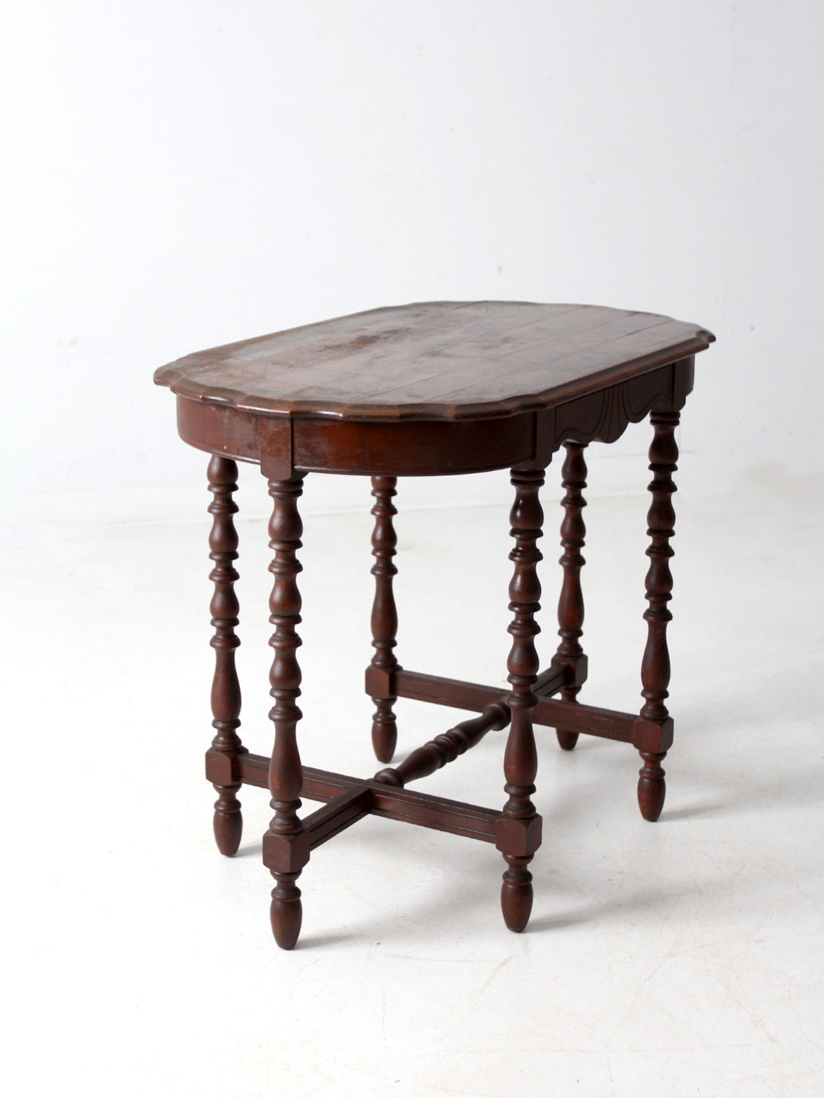 antique accent table with scalloped top