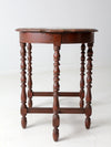 antique accent table with scalloped top