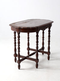 antique accent table with scalloped top