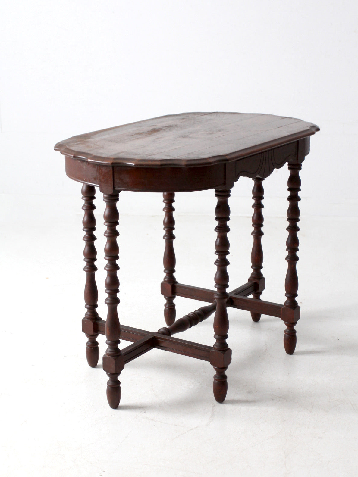 antique accent table with scalloped top