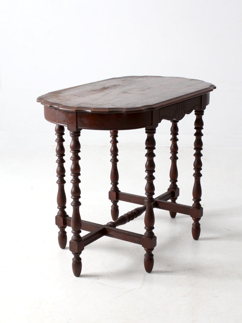 antique accent table with scalloped top