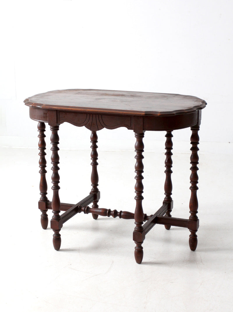 antique accent table with scalloped top