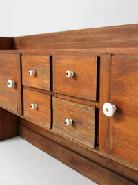 antique primitive tabletop cabinet with drawers and cupboards