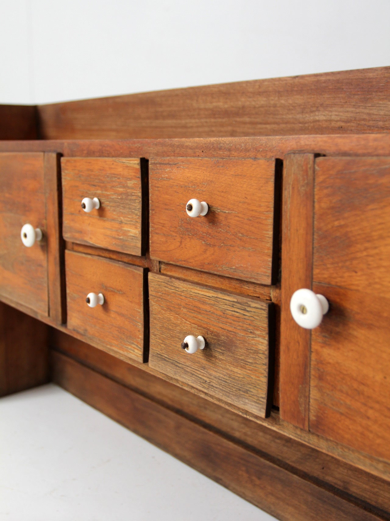 antique primitive tabletop cabinet with drawers and cupboards