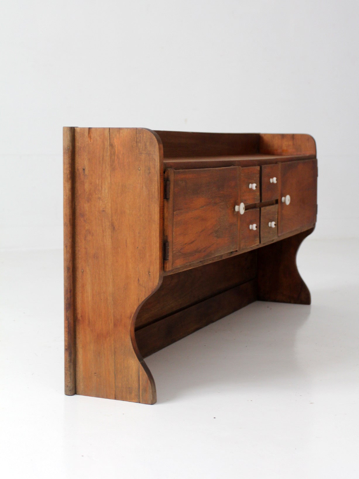 antique primitive tabletop cabinet with drawers and cupboards