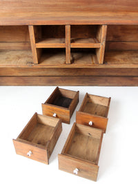 antique primitive tabletop cabinet with drawers and cupboards