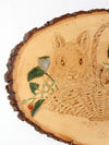 vintage cottage wall art on wood slab
