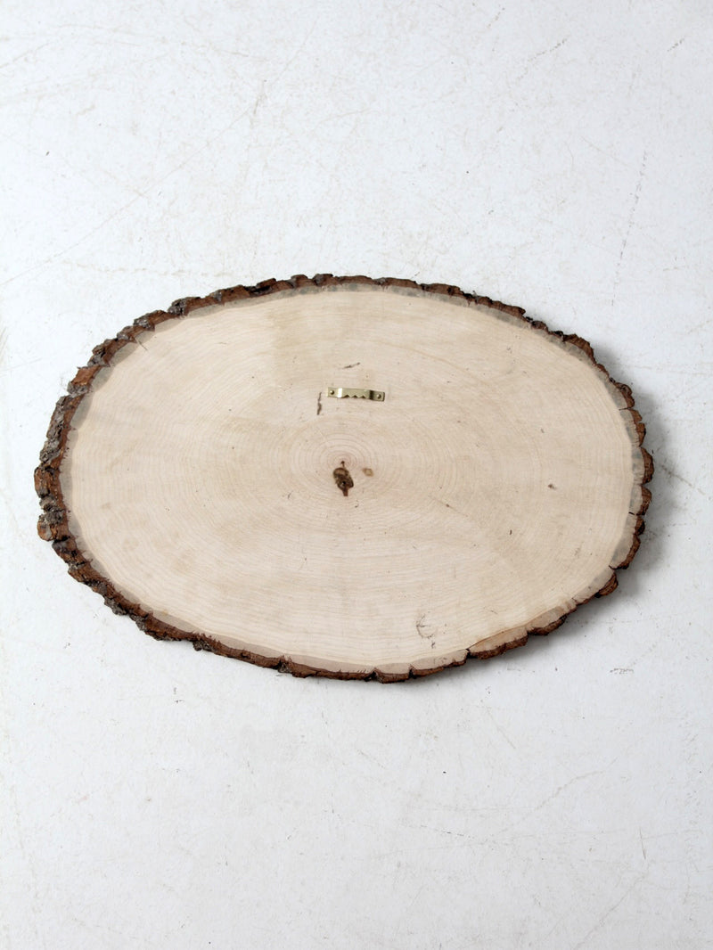 vintage cottage wall art on wood slab