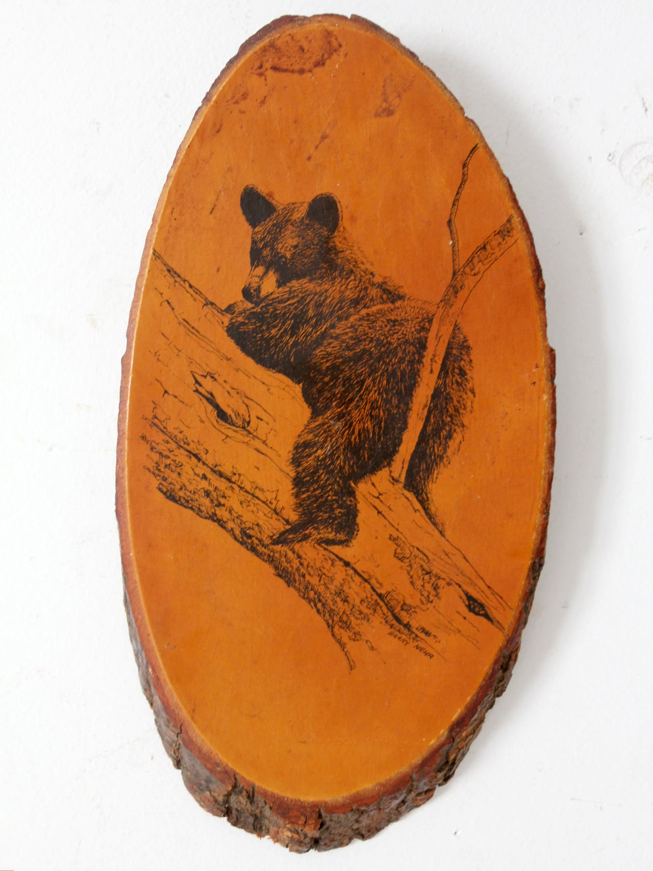 vintage Barry Nehr bear cub wood slice wall hanging