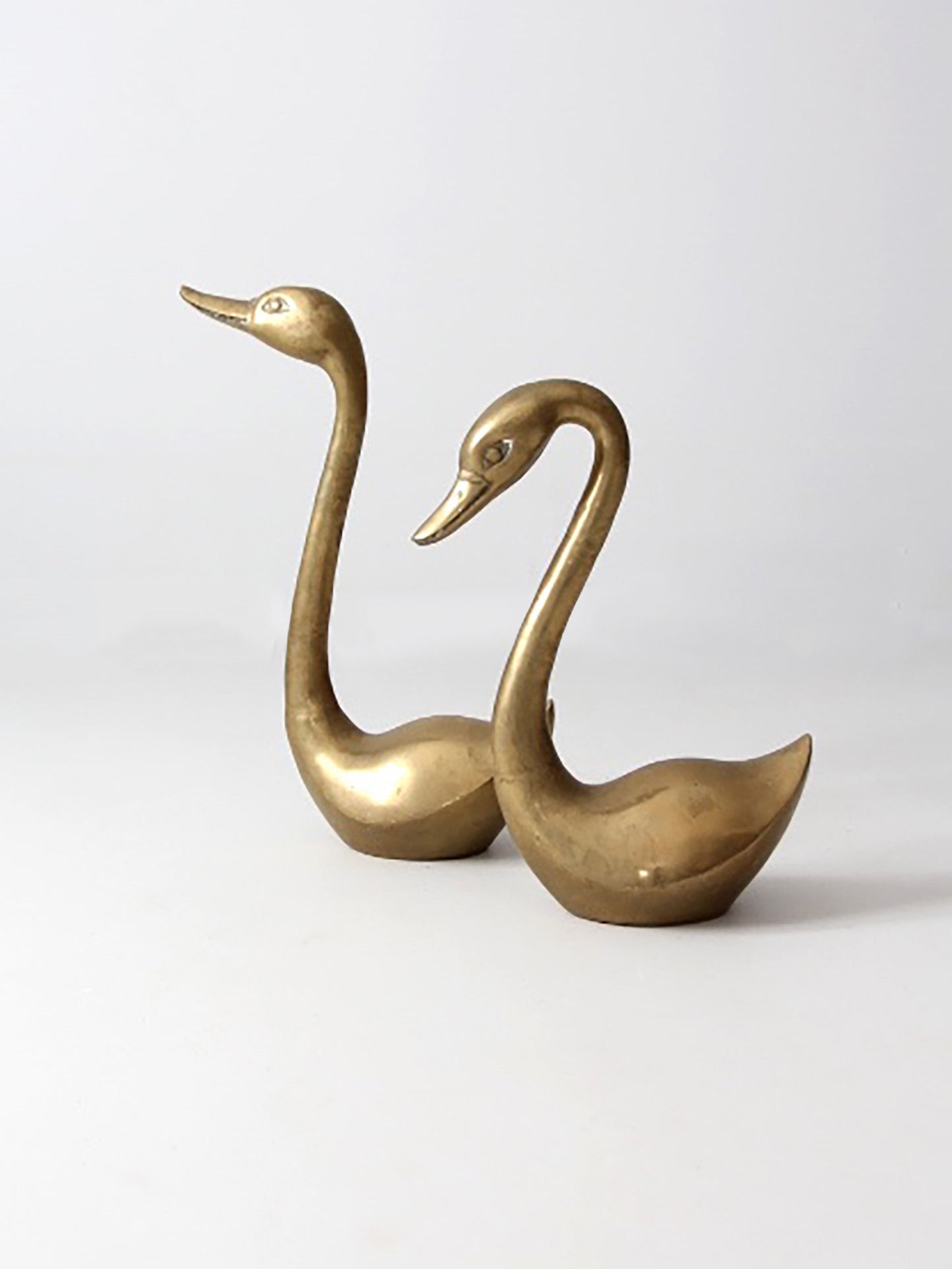 large mid-century brass swans