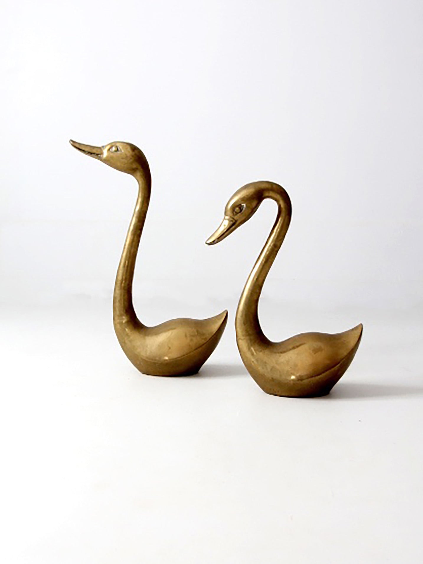 large mid-century brass swans