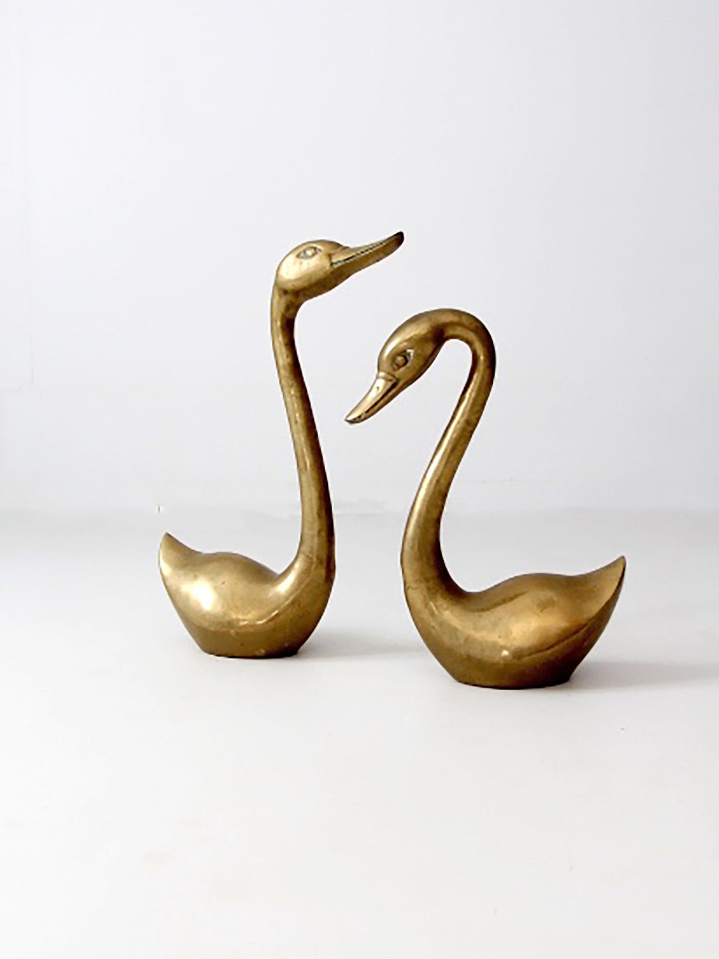 large mid-century brass swans