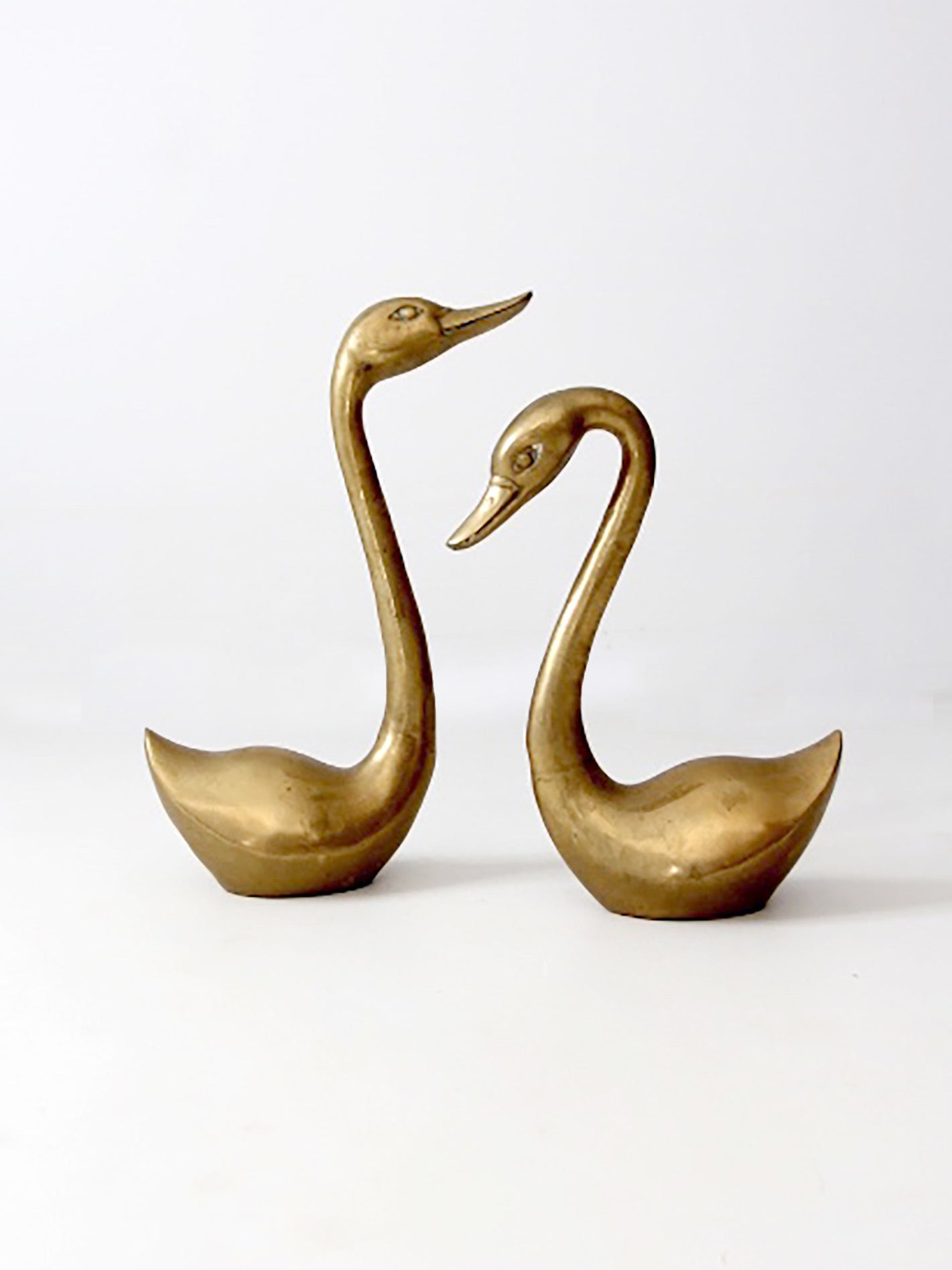 large mid-century brass swans