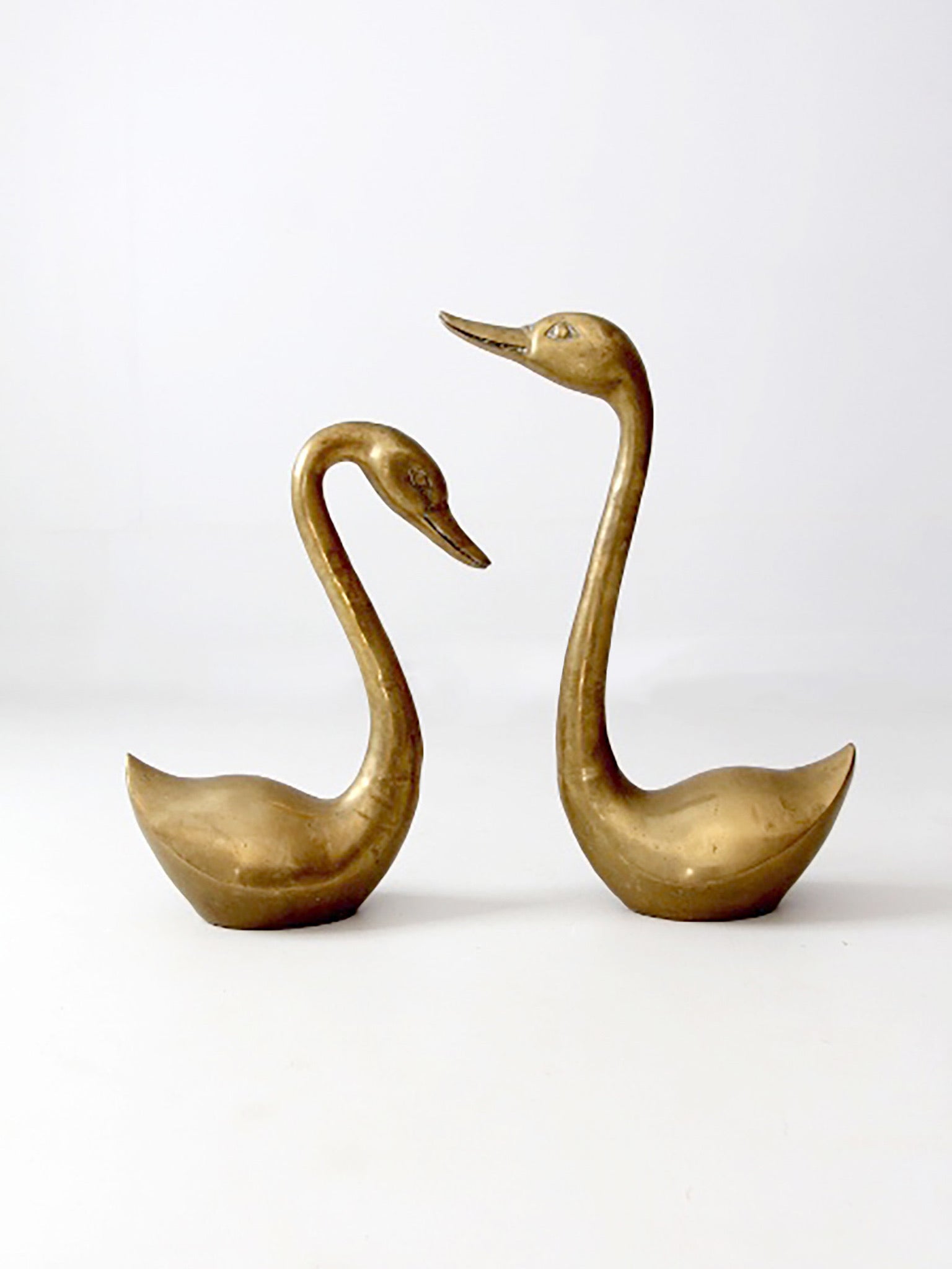 large mid-century brass swans