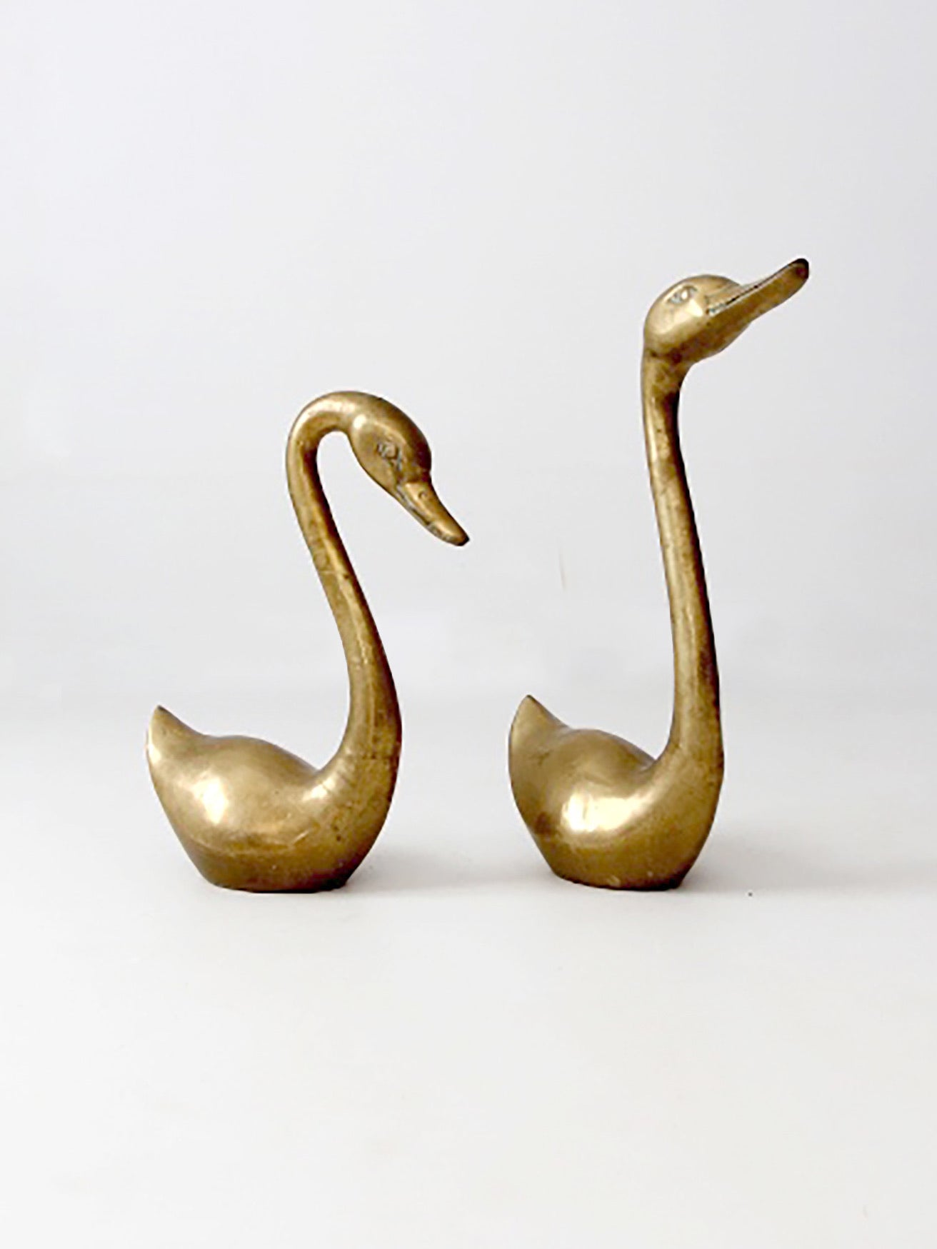 large mid-century brass swans